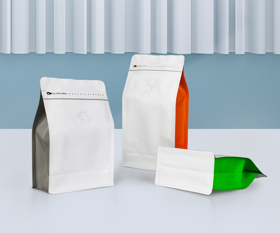White flat-bottom bags with contrasting colored side panels